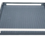 Navy blue 37 cm tray from low down, the front rail crossing the frame above the woven leather base