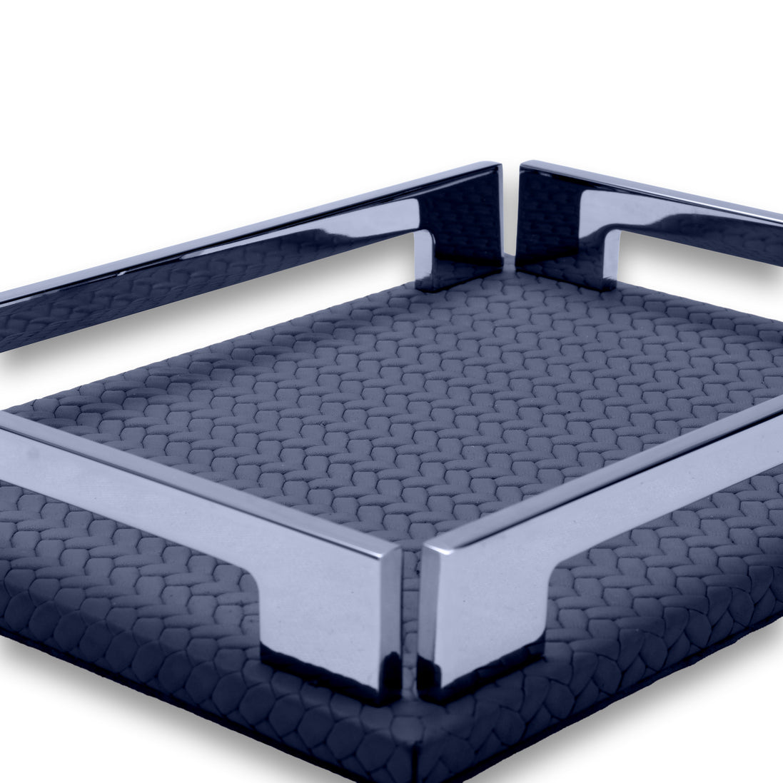 Corner detail of the navy tray, two steel brackets set against the full-grain leather floor