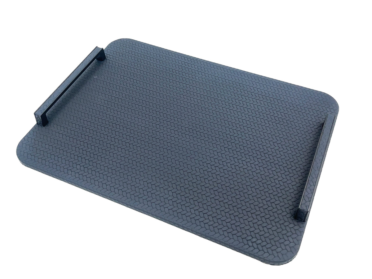 Navy blue 48 cm tray at an angle, one black steel handle raised at the far corner over the woven leather