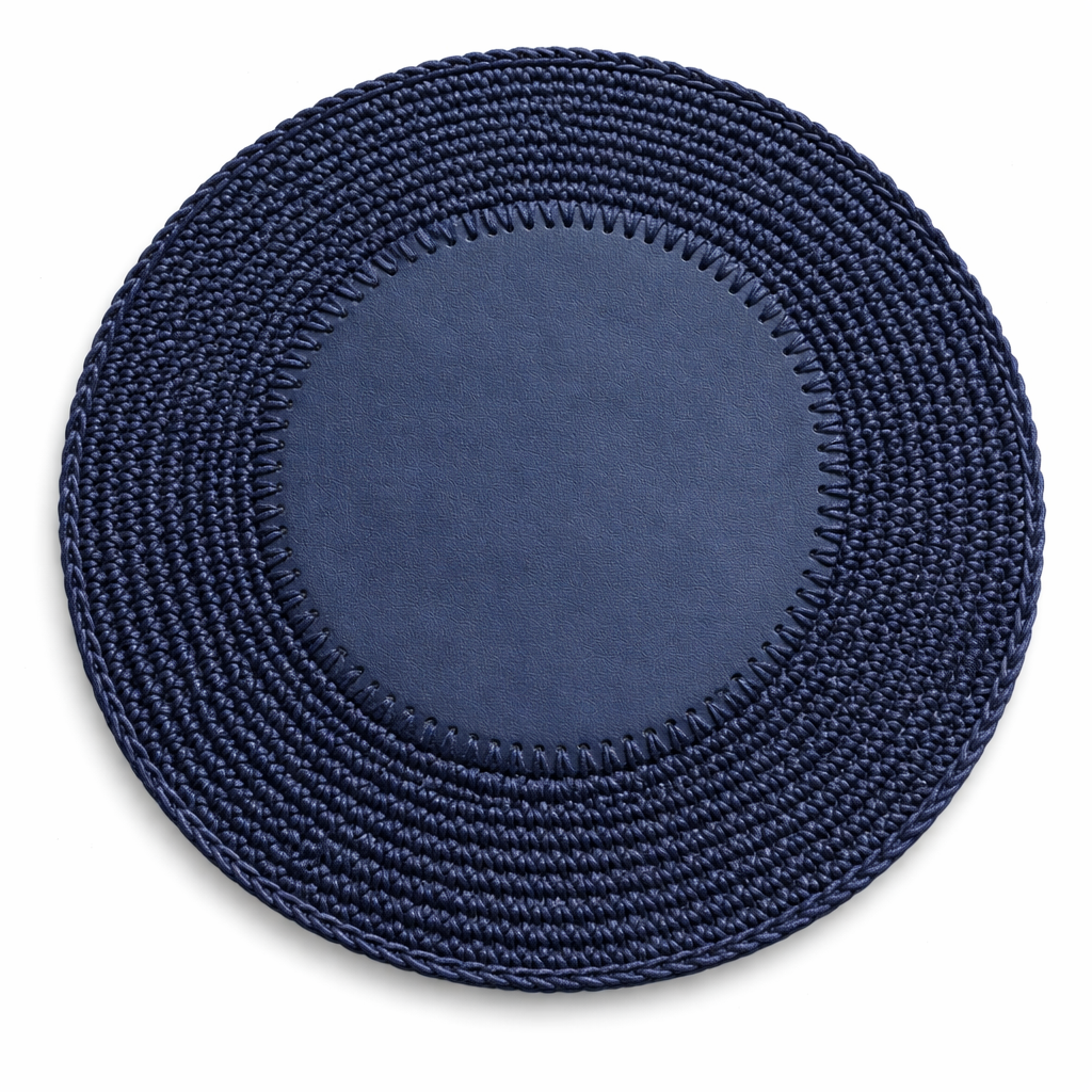 The 36 cm placemat in navy from above, whipstitching joining the leather centre to the cord border