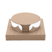 Pale sand set, the top coaster's plait level with the rim of the steel band
