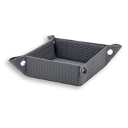 Grey valet tray from above, the studs lifting four flat leather panels into a 6 cm well