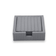 Grey holder seen square on, the six leather discs stacked flush inside it