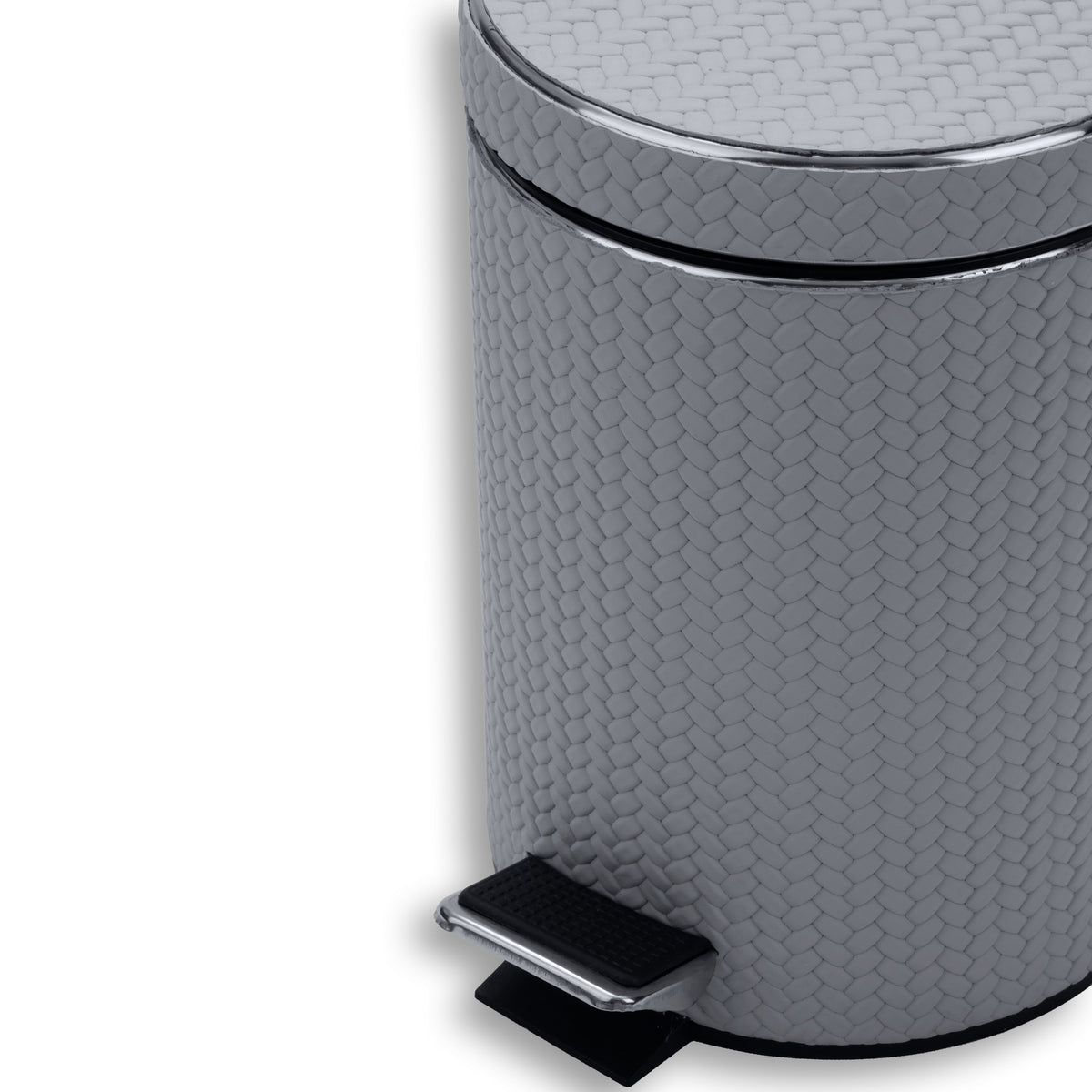 Close on the grey bin's body, woven-embossed leather at full scale above the chrome pedal