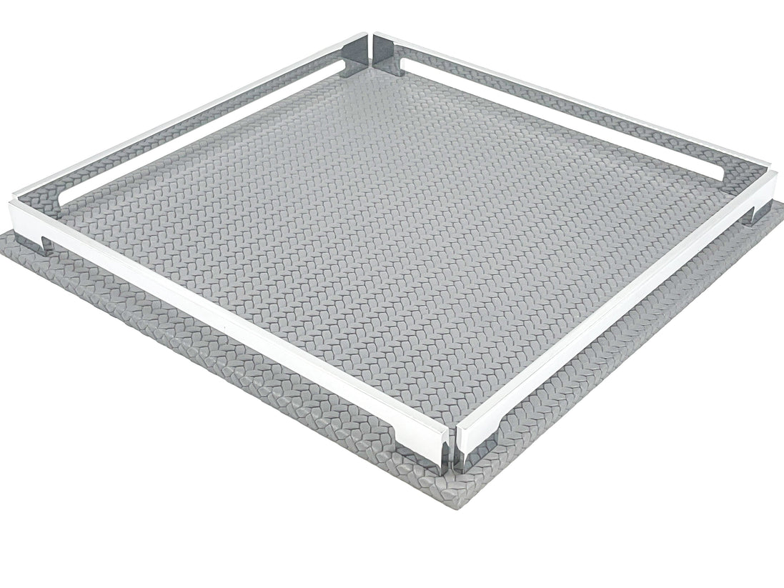 Grey 37 cm tray from above right, the 1 cm leather base visible beneath the steel rails