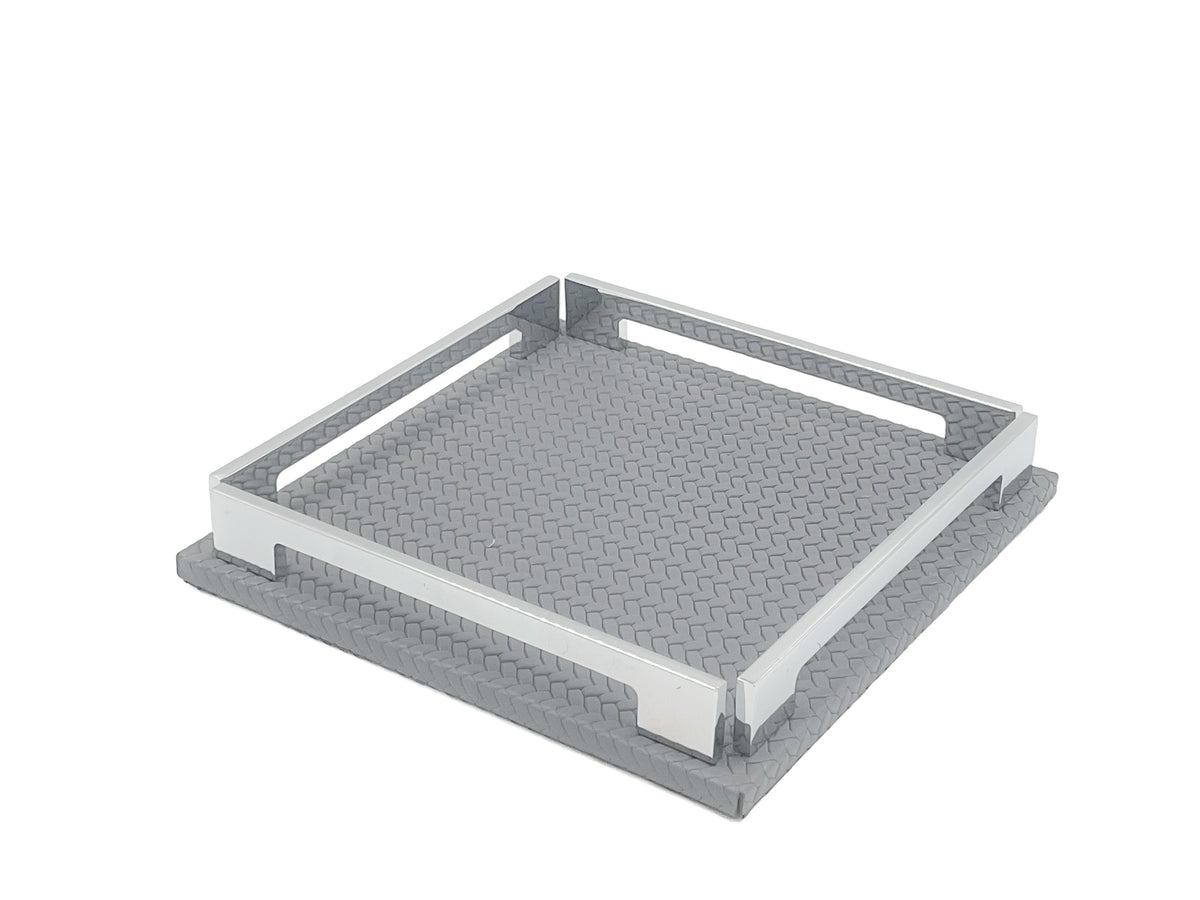 Grey 25 cm tray from the corner, polished brackets standing on the full-grain leather base