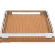 Tan 25 × 25 cm tray face on, warm leather floor framed by the polished steel surround
