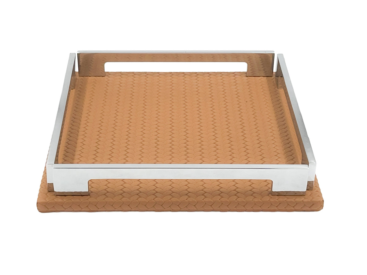 Tan 25 × 25 cm tray face on, warm leather floor framed by the polished steel surround