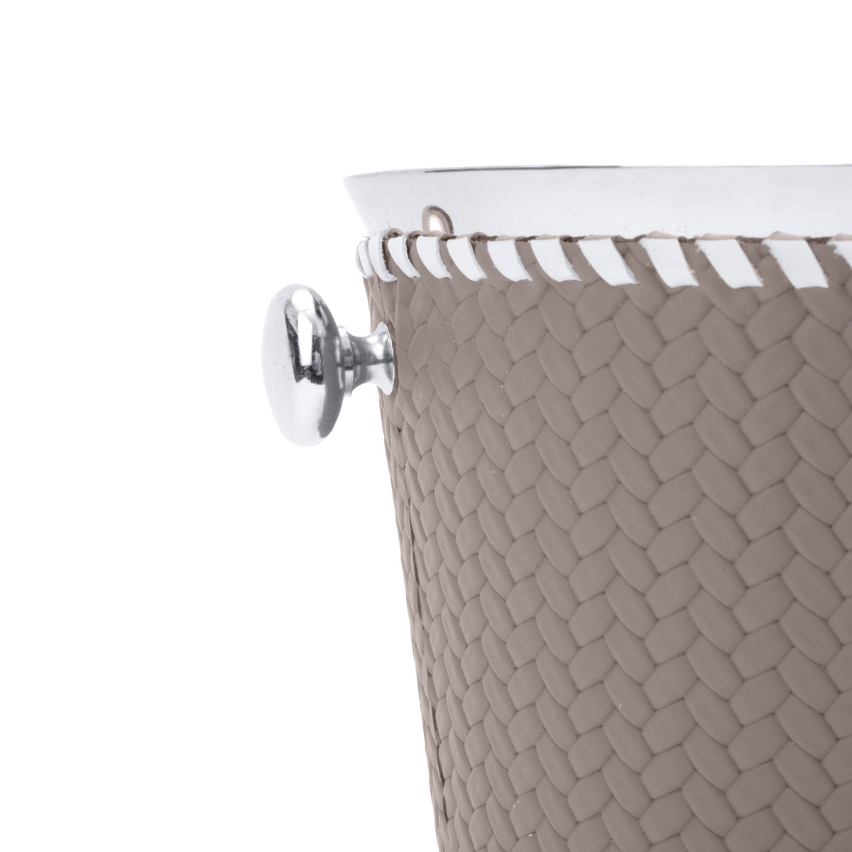 Close on one steel ring handle of the mink bucket, whip-stitched rim and woven leather at full scale