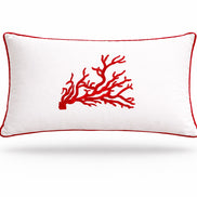 Red coral embroidered on the white 35 x 55 cm rectangular cushion, red piping around the edge