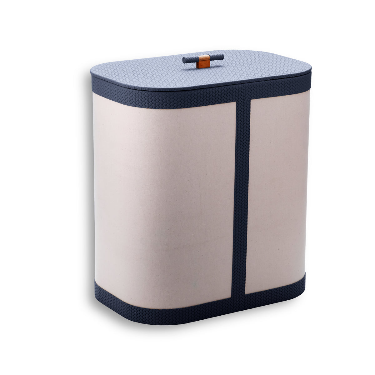 Navy leather binding on the canvas hamper, running the corners of the 50 cm high body