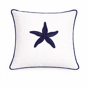 Navy starfish embroidered at the centre of a white 45 x 45 cm outdoor cushion, navy piping