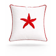 Red starfish embroidered on a white 45 x 45 cm outdoor cushion edged in red piping