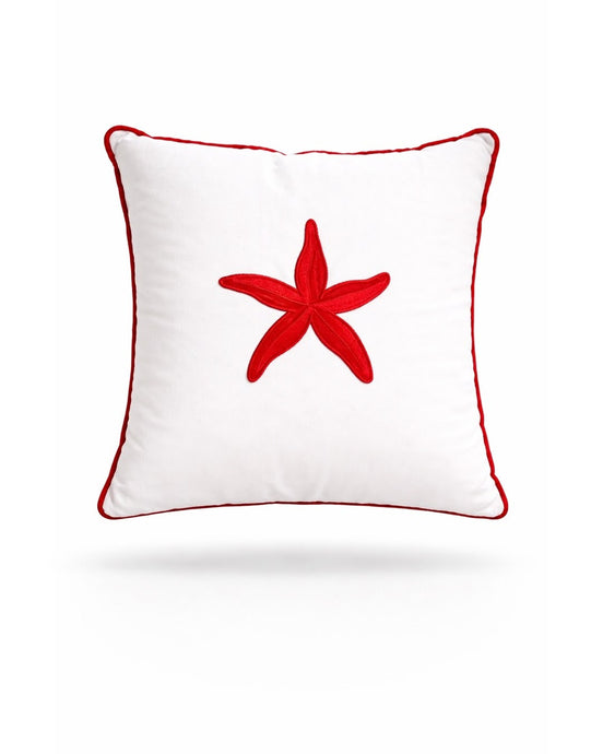 Red starfish embroidered on a white 45 x 45 cm outdoor cushion edged in red piping