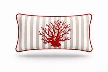 Red coral embroidered across the 35 x 55 cm beige striped outdoor cushion, red piping at the seam