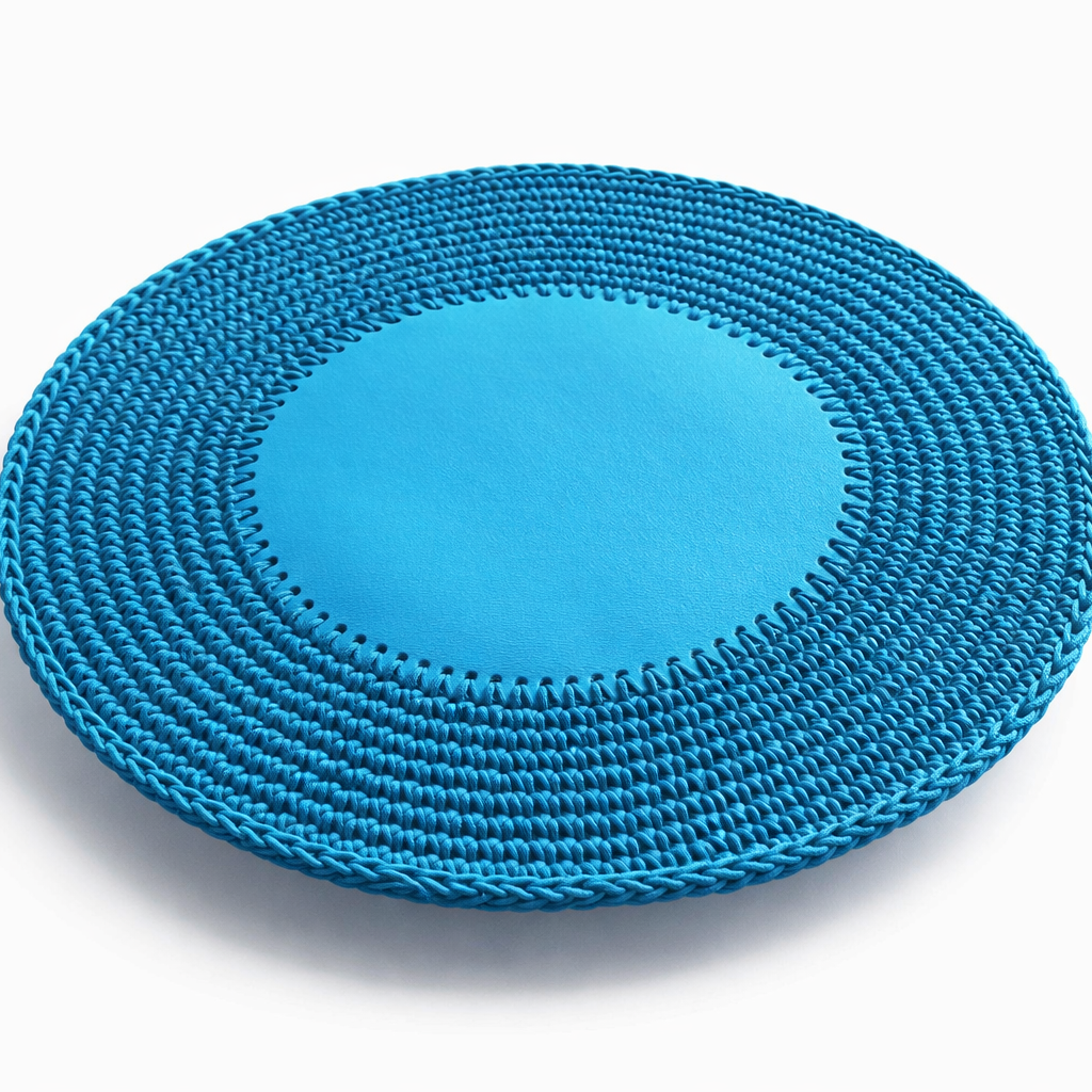 The blue round placemat angled, its leather centre flush inside a crocheted cord border