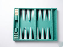 Turquoise woven leather backgammon board open flat, black and white points across the 50 cm bed