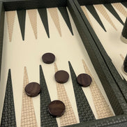 Close-up of the forest green board, dark brown checkers on green and beige woven leather points