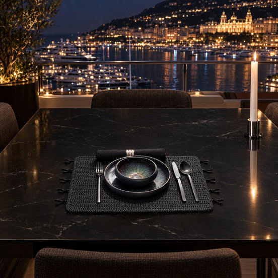 Black Woven Cord Placemat with Coral-Shaped Trim — late dinner on the upper-deck alfresco table in Monaco harbour