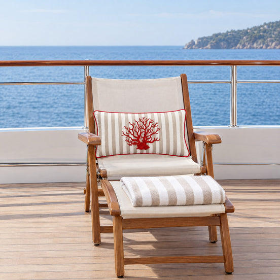 Coral Embroidered Rectangular Outdoor Cushion – Beige Stripe, 35 × 55 cm — the promenade side deck in the late morning
