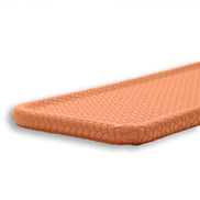 Grey slim tray, the woven surface and the shallow rim that keeps small items contained
