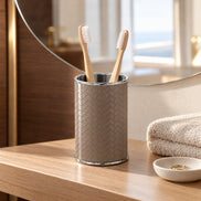 Leather-Wrapped Bathroom Brush Holder — morning routine at the owner's vanity