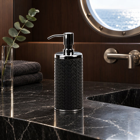 Leather-Wrapped Liquid Soap Dispenser — a guest head with a bold, dark mood