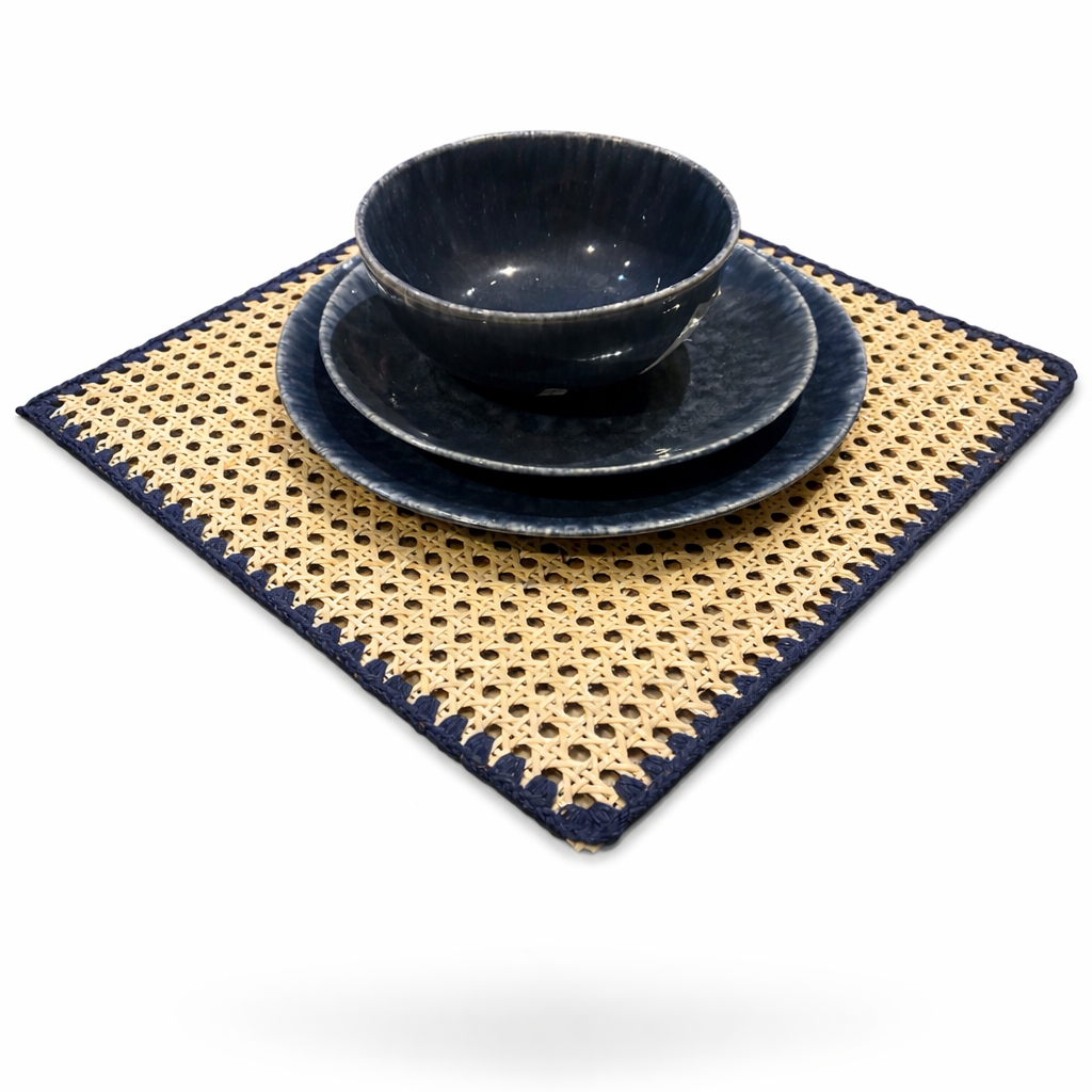 The bamboo placemat at an angle showing the open cane pattern