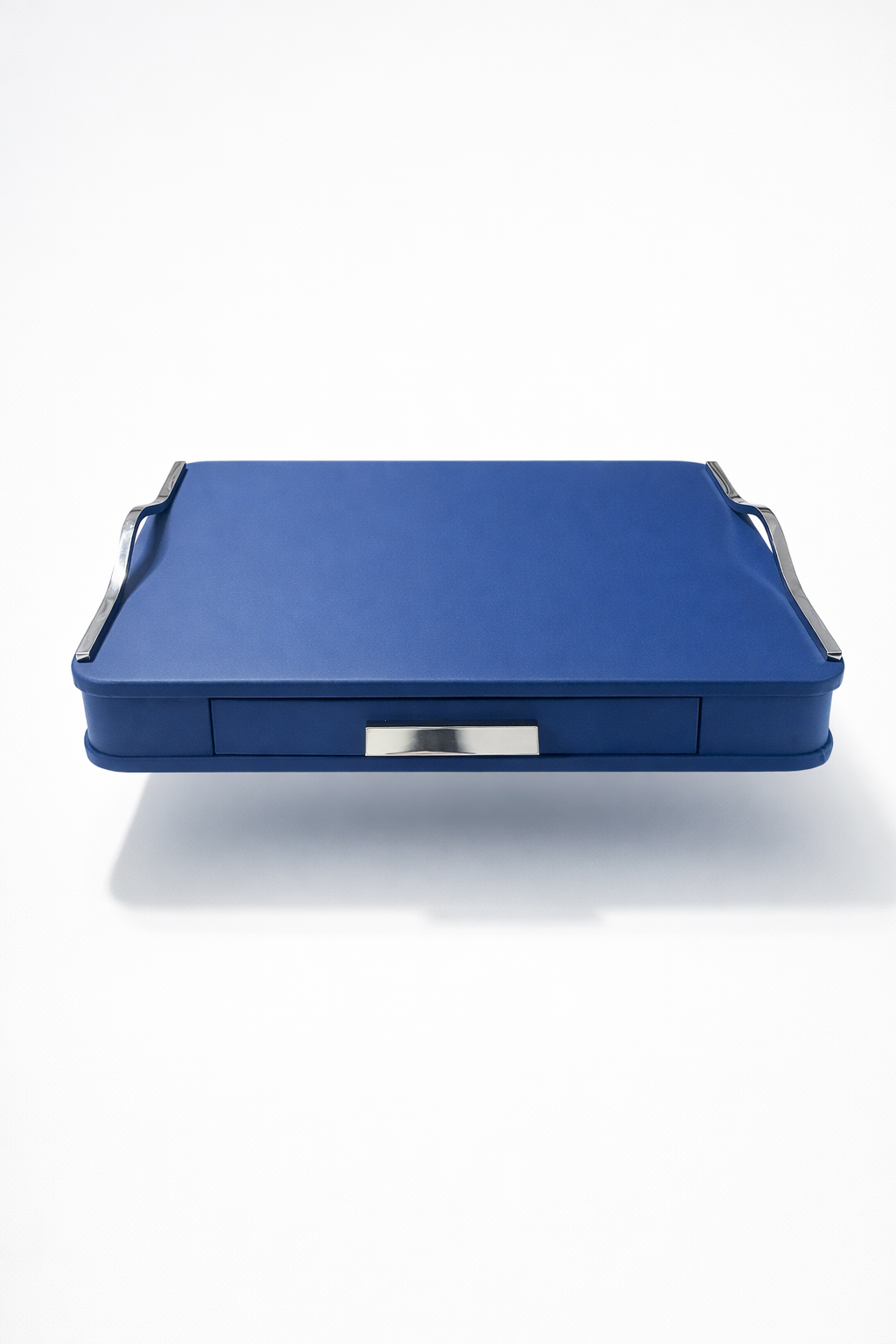 The capsule box open, drawers holding coffee capsules in rows