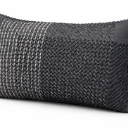 The anthracite hand-laced cushion showing its woven yarn texture