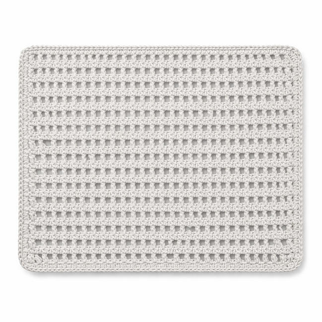 White leather cord placemat in an open crocheted lattice, 40 x 30 cm