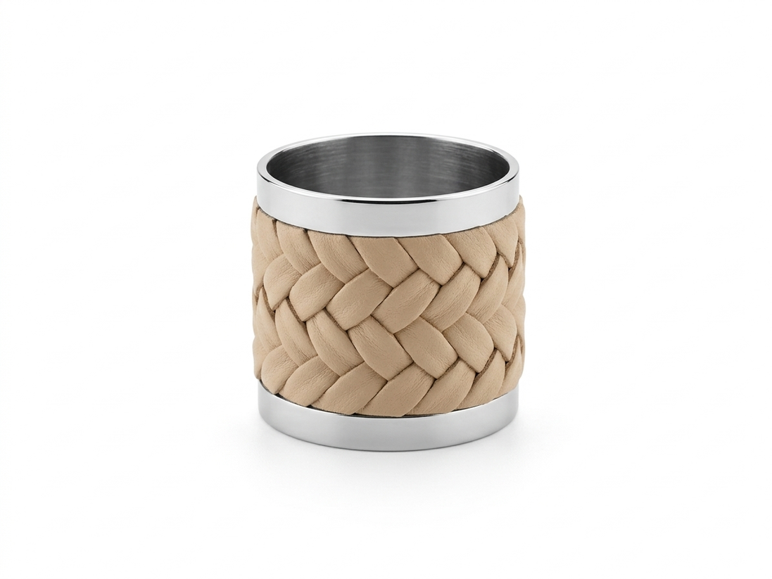 Beige braided leather napkin ring framed by polished steel