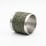 The khaki napkin ring at an angle, tight leather braid