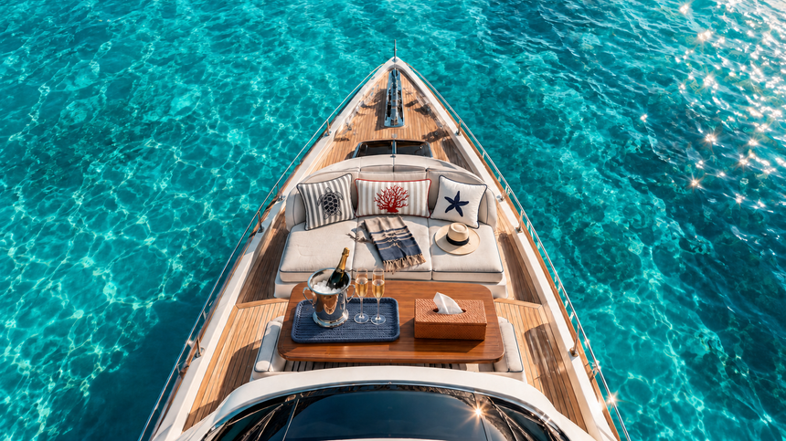 Luxury yacht foredeck styled with Veyra Deck woven leather accessories and marine-inspired cushions