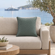Woven Leather Decorative Cushion – 45 × 45 cm — the shaded terrace of a private island beach house